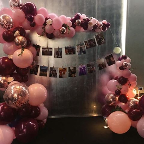 Beautiful pink and burgundy balloons for a…